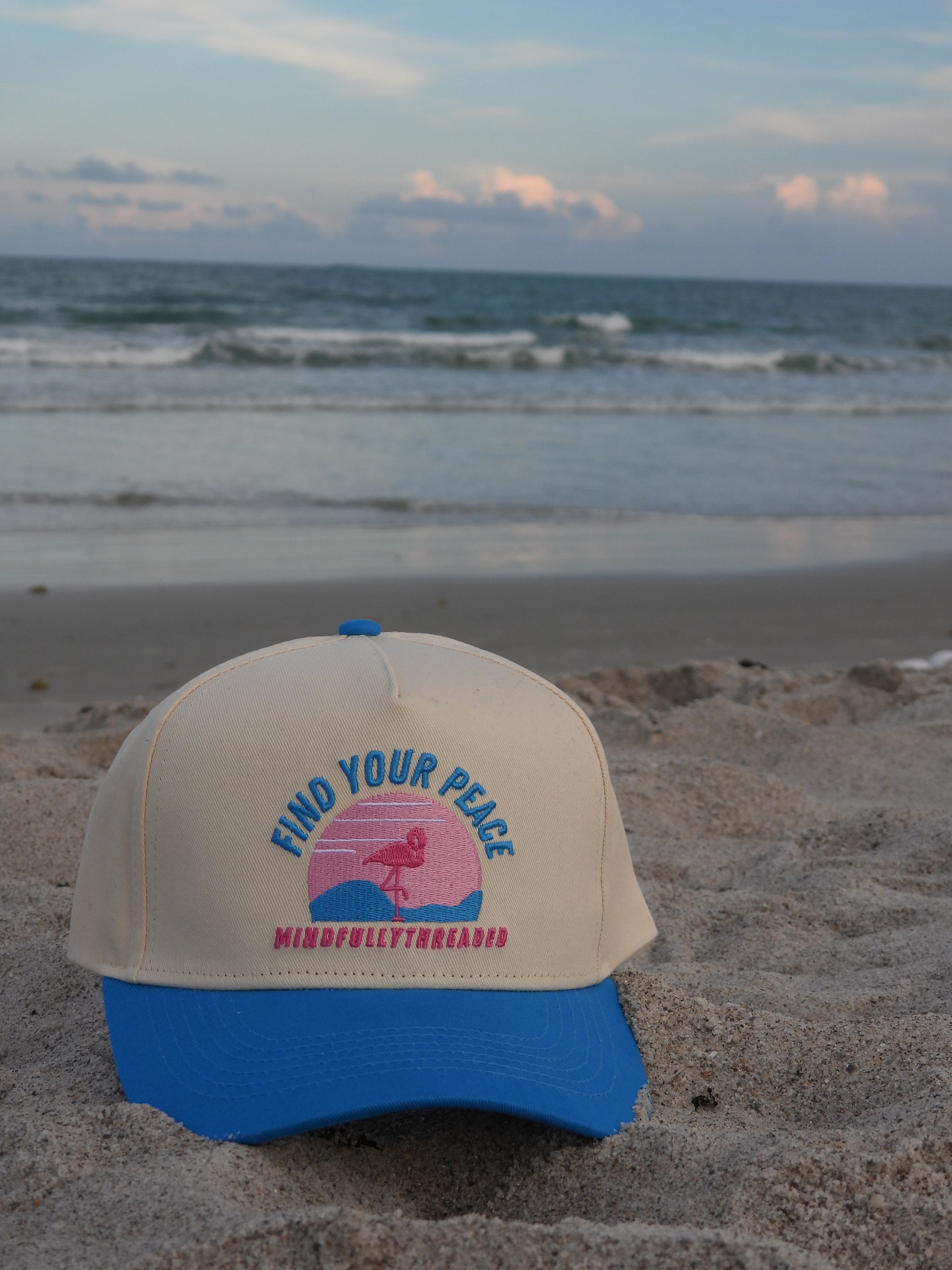 Hat on the beach perfect for sunny days and finding peace